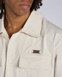 CAMICIA IN COTONE LEGGERO E LOGO METALLICO LATO CUORE