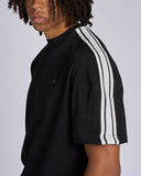T-SHIRT CON BANDE SMACCHINATE