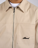 GIACCA CON LOGO METALLICO