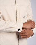 GIACCA CON LOGO METALLICO