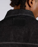 GIACCA IN DENIM NERO E CUCITURE BIANCHE