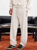PANTALONE IN FELPA CON ZIP LATERALI