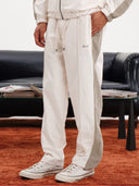 PANTALONE IN TESSUTO TECNICO CON BANDE LATERALI