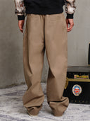 PANTALONE AMPIO CON TASCONI