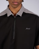 POLO EFFETTO NIDO D'APE CON BANDE LATERALI CON ZIP