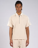 POLO EFFETTO NIDO D'APE CON BANDE LATERALI CON ZIP