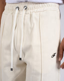 PANTALONE EFFETTO DENIM CON LOGO METALLICO
