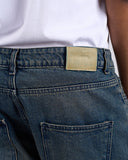 JEANS BLU CON EFFETTO SABBIA