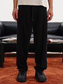PANTALONE IN FELPA CON ZIP LATERALI