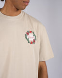 T-SHIRT IN COTONE CON RICAMO ROSA E ETICHETTA CON LOGO
