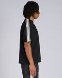 T-SHIRT CON BANDE SMACCHINATE