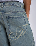 BERMUDA IN DENIM CON TASCA LASERIZZATA