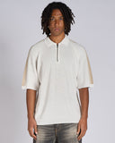 POLO IN MAGLIA CON BANDE SMACCHINATE