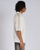 POLO IN MAGLIA CON BANDE SMACCHINATE