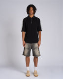 POLO IN MAGLIA CON BANDE SMACCHINATE
