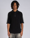 POLO IN MAGLIA CON BANDE SMACCHINATE