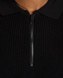 POLO IN MAGLIA CON BANDE SMACCHINATE