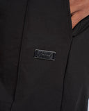 PANTALONE MORBIDO OCN LOGO METALLICO