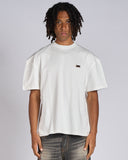 T-SHIRT CON LOGO METALLICO LATO CUORE