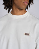 T-SHIRT CON LOGO METALLICO LATO CUORE
